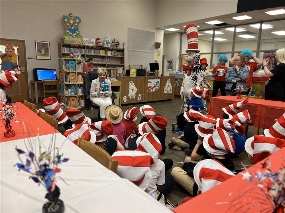 Special guest reader Becky Watson, Executive Director of OIA, reading \